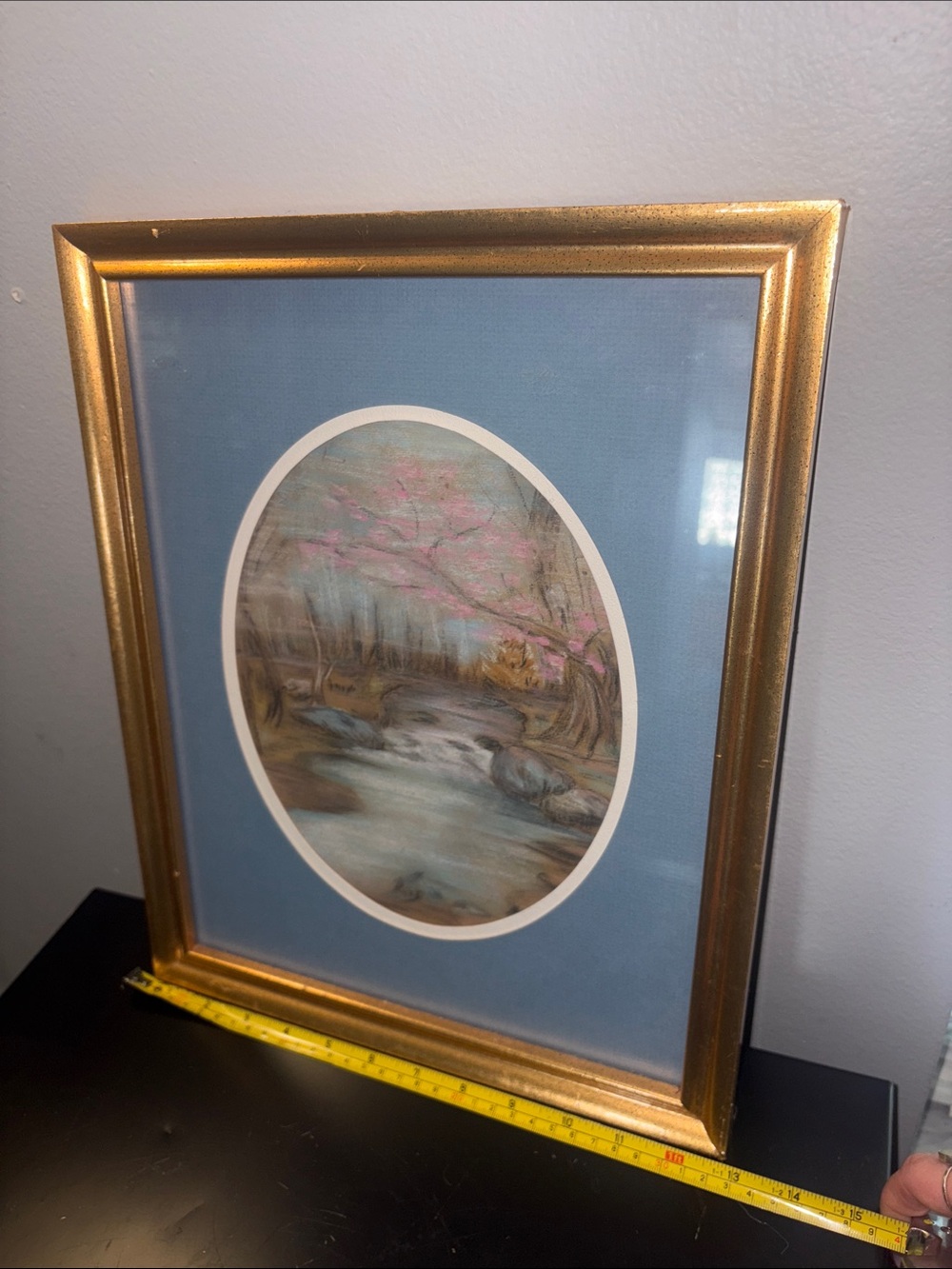 Framed Oval Landscape Artwork with Gold Frame and Blue Mat